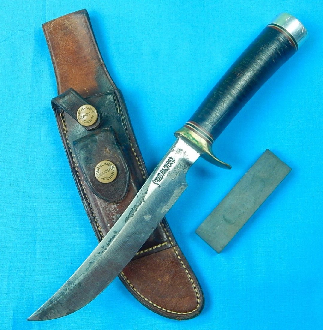 Vintage Custom Made RANDALL Model 4 6 Hunting Knife: NO BUYER"S PREMIUM! (BUYER"S PREMIUM 0%). Vintage US Custom Hand Made RANDALL Model 4 6 Hunting Knife with Leather Sheath and Sharpening Stone. Size: 10 7/8" total length, the blade is 6".We accept pa