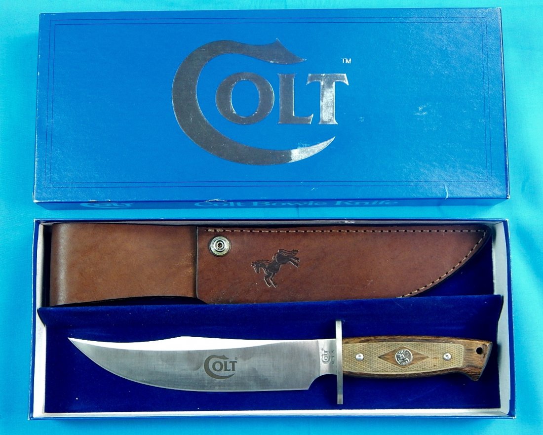 US COLT CT1 Bowie Fighting Knife with Sheath & Box: NO BUYER"S PREMIUM! (BUYER"S PREMIUM 0%).US COLT CT1 Bowie Fighting Knife with Leather Sheath and Original Box.Size: 12 3/8" total length, blade is 7 7/8".We accept payment by check or money orders.Pa
