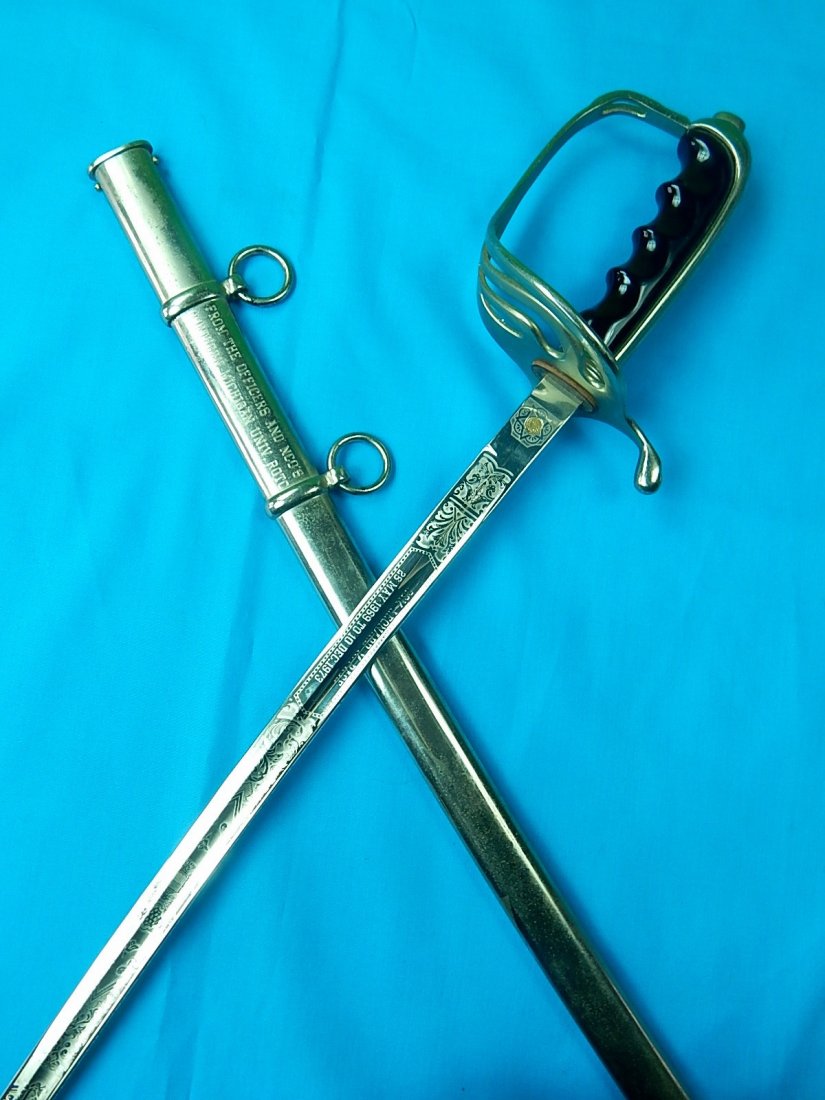 US Model 1902 Presentation Engraved Officer's Sword: NO BUYER"S PREMIUM! (BUYER"S PREMIUM 0%). Vintage US Model 1902 Presentation Engraved Officer's Sword with Scabbard. 37 1/2" long with 32" blade. We accept payment by check or money orders.Pay Pal and