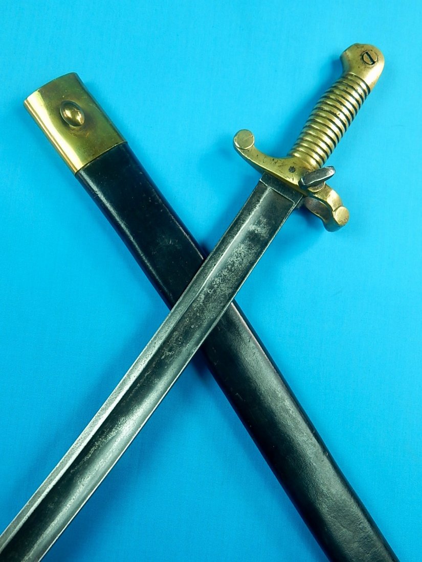 Civil War M 1841 Mississippi Rifle Snell Bayonet Sword: NO BUYER"S PREMIUM! (BUYER"S PREMIUM 0%).Original US Civil War Model 1841 Mississippi Rifle Snell Bayonet with Scabbard. The bottom ring is missing.The scabbard is the replacement, not original. 26 7/