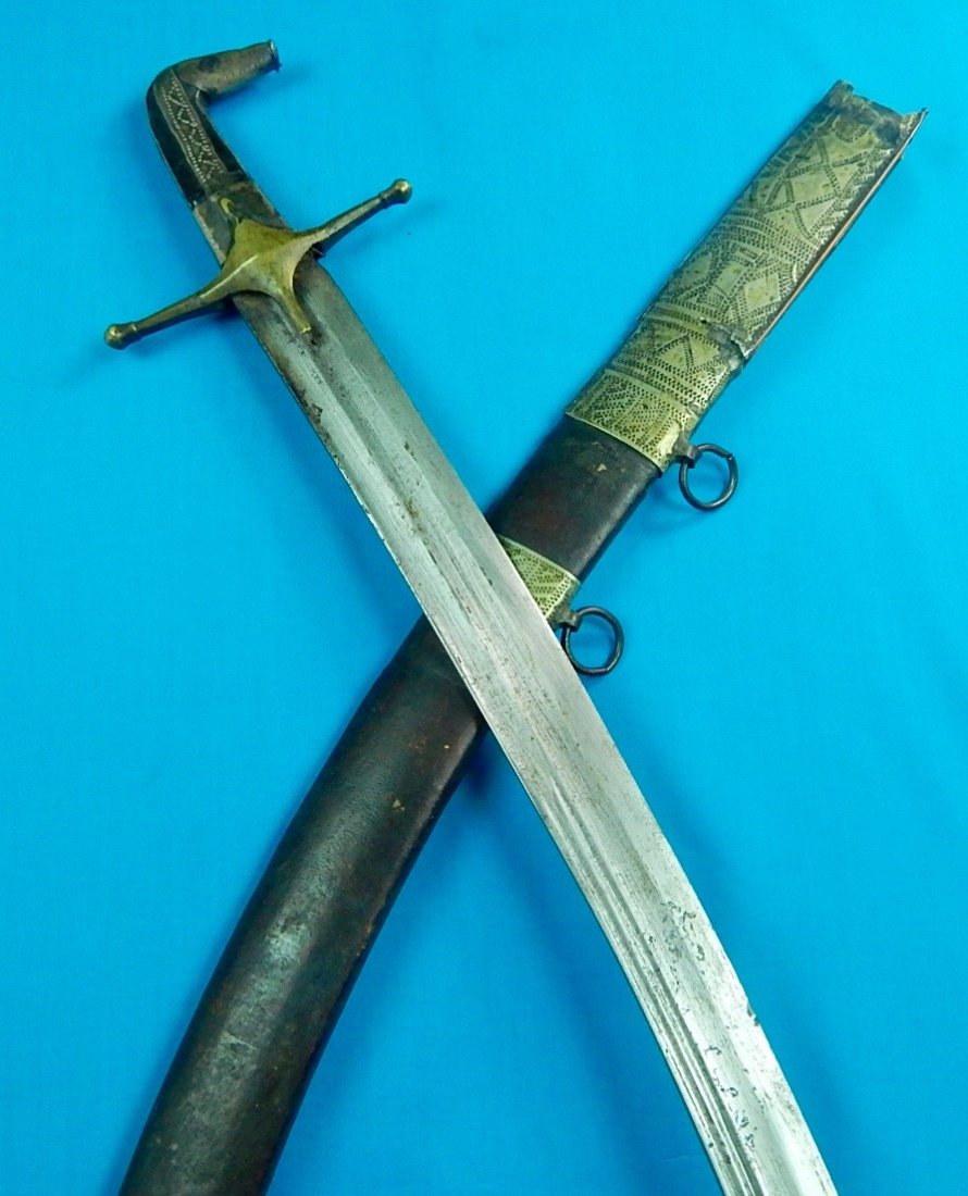 Antique 19 Century Middle Eastern East Shamshir Sword: NO BUYER"S PREMIUM! (BUYER"S PREMIUM 0%).Original Antique 19 Century Middle Eastern Shamshir Sword with Scabbard. 36 1/4" total length. The blade is 31 3/4".We accept payment by check or money orders.