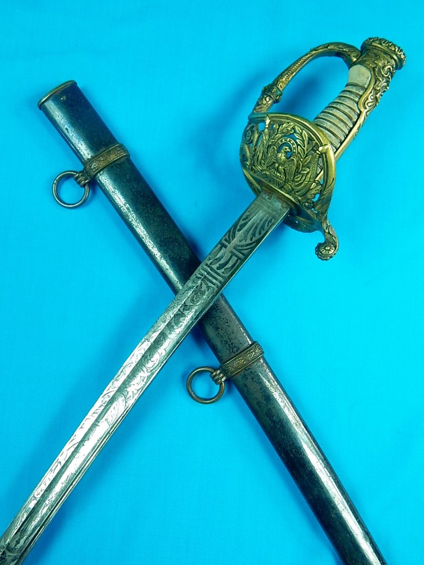 US Civil War French Presentation Cavalry Officers Sword: NO BUYER"S PREMIUM! (BUYER"S PREMIUM 0%).Original US Civil War French Made Presentation Grade Cavalry Officer's Sword with Scabbard. Triple engraved blade. 42 1/4" total length. The blade is 36". The 