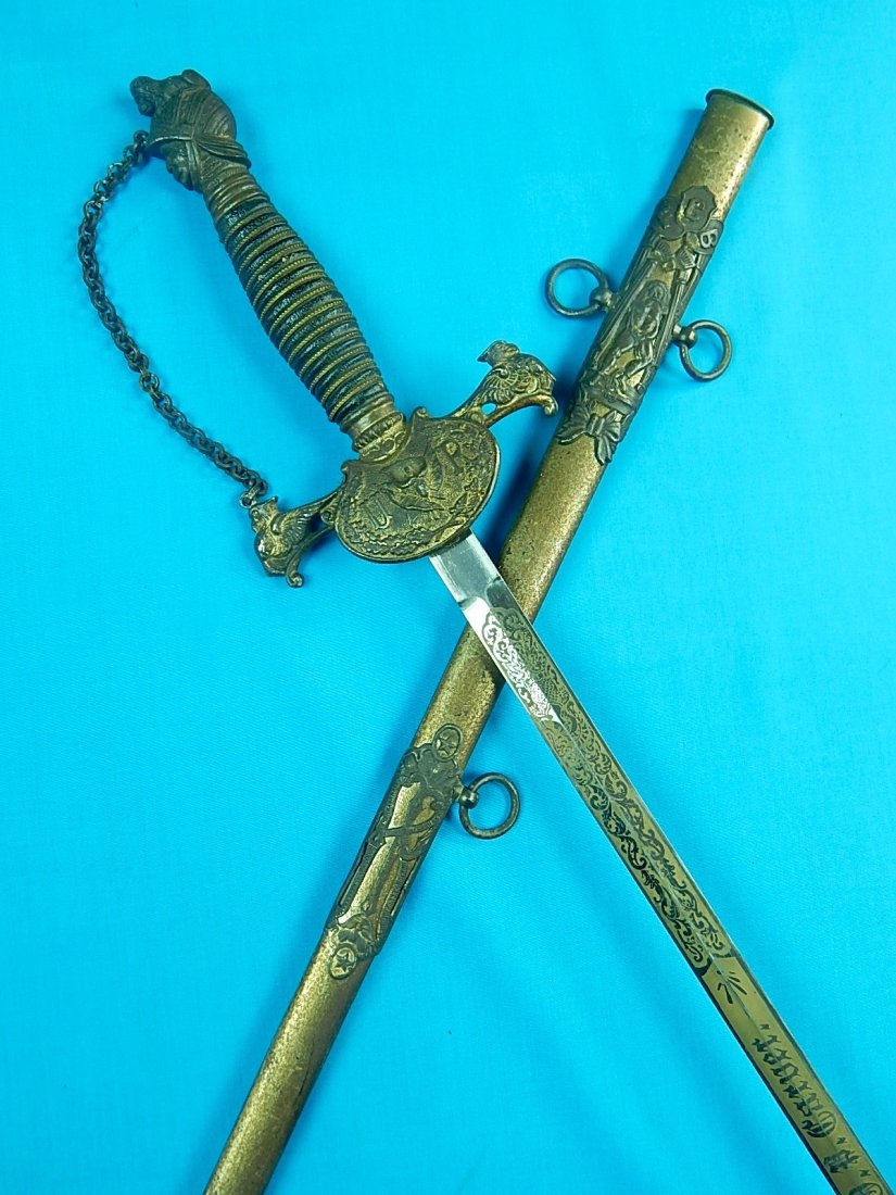 Vintage US German Made Fraternal Masonic Sword Scabbard: NO BUYER"S PREMIUM! (BUYER"S PREMIUM 0%).Original Vintage US German Made Fraternal Sword with Scabbard. 31 3/4" total length. The blade is 26 3/4".We accept payment by check or money orders.Pay Pal an