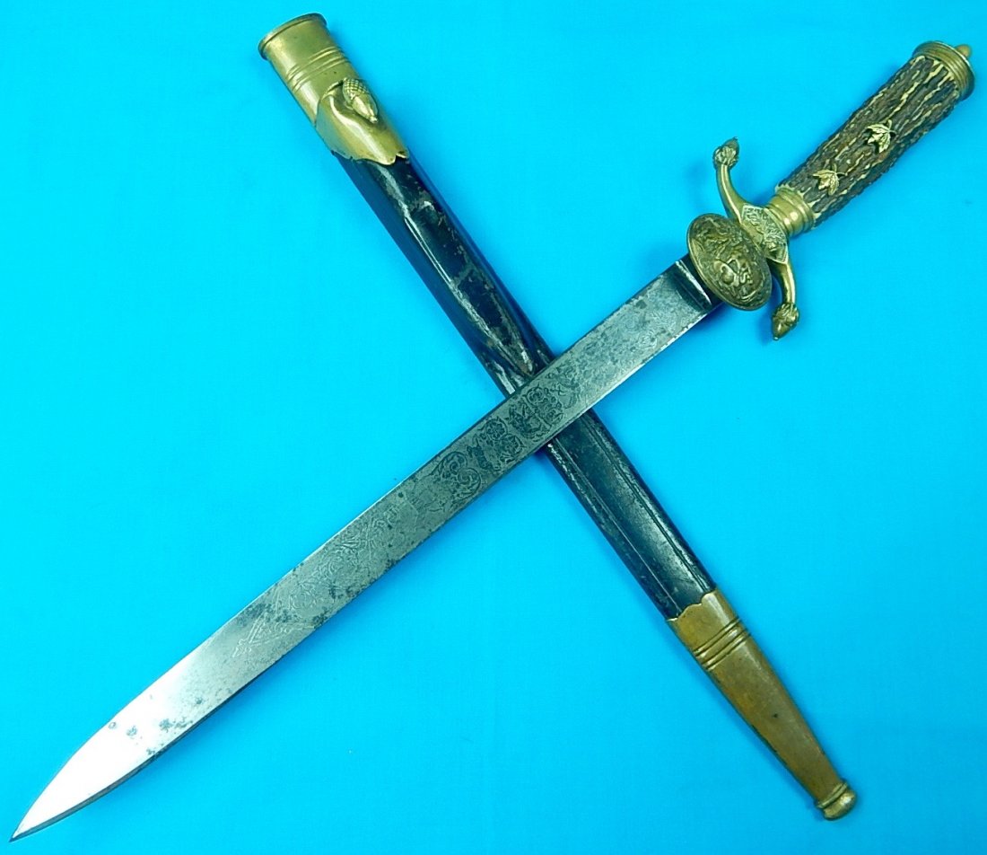 German WW1 Carl Kaiser Large Hunting Dagger Sword Knife: NO BUYER"S PREMIUM! (BUYER"S PREMIUM 0%).German WWI Carl Kaiser Large Engraved Hunting Dagger with Scabbard. Stag handle. Size: 22 3/4" long with 16 1/4" blade.We accept payment by check or money orde