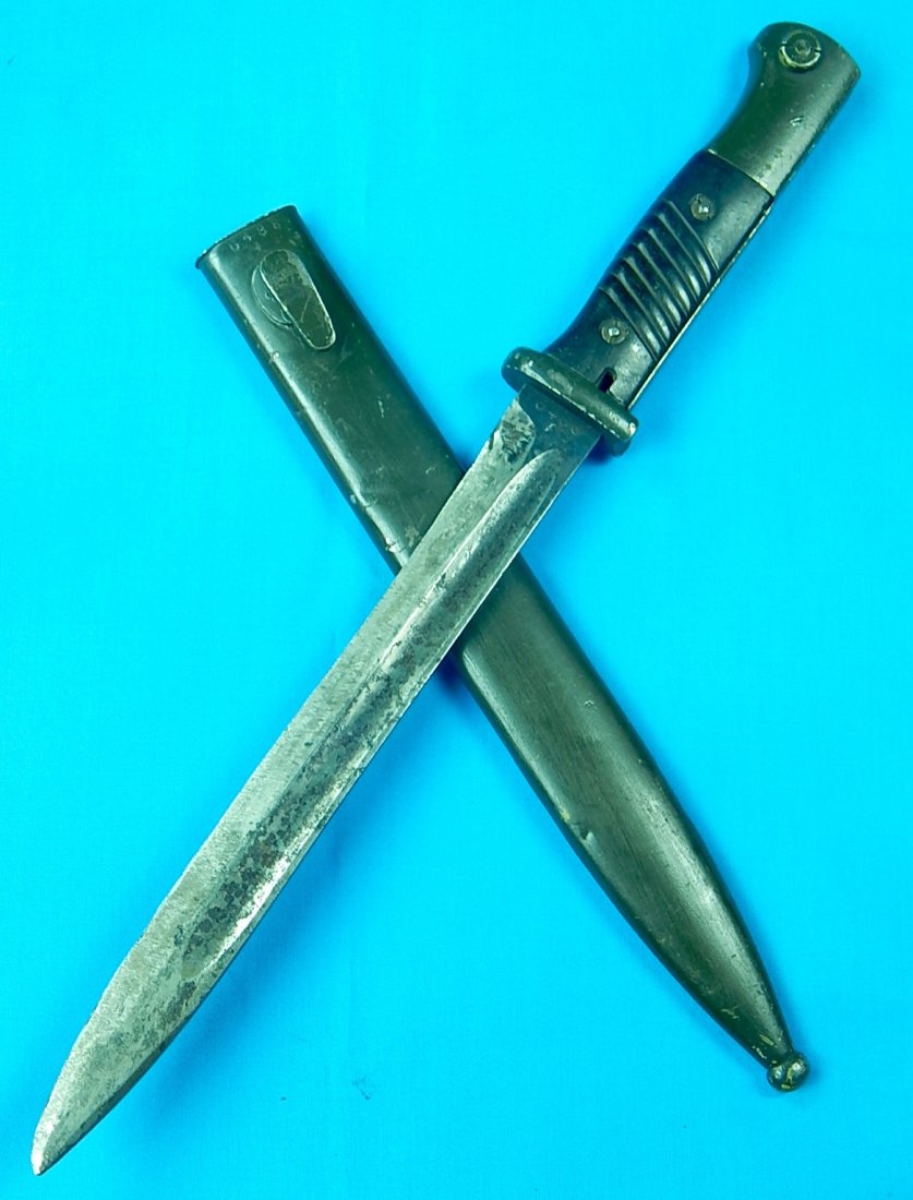 German Germany WW2 Mauser K98 Bayonet Knife Match #: NO BUYER"S PREMIUM! (BUYER"S PREMIUM 0%).German WW2 1940 Mauser K98 Bayonet with Scabbard. Matching # on the blade and the scabbard. Painted dark green color. Size: 14 5/8" long with 10 3/8" blade.We 