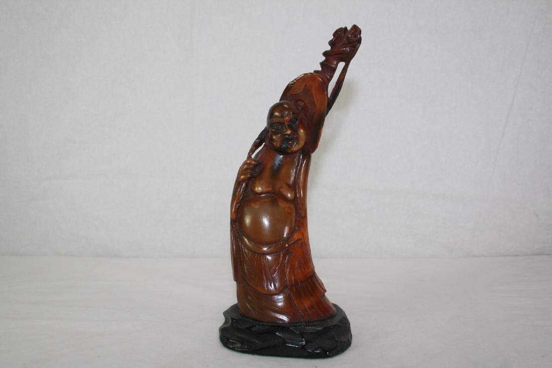 Asian Ox Horn Carved Buddha Statue: Asian Ox Horn Carved Buddha Statue, 8.25" high.