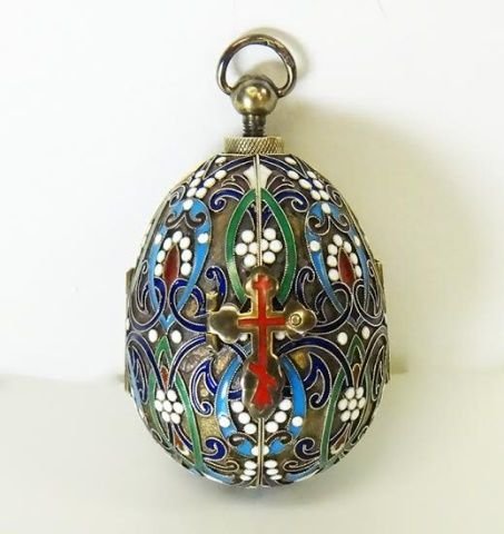 RUSSIAN SILVER ENAMEL EGG WITH ICON: Multi Colored Enamel with Gold Wash Silver inside contains Silver Purity Marks, maker's Marks, and Town Hall Mark. Icon is also inside Egg. Total Item weight : 310.4g height : 122.86mm