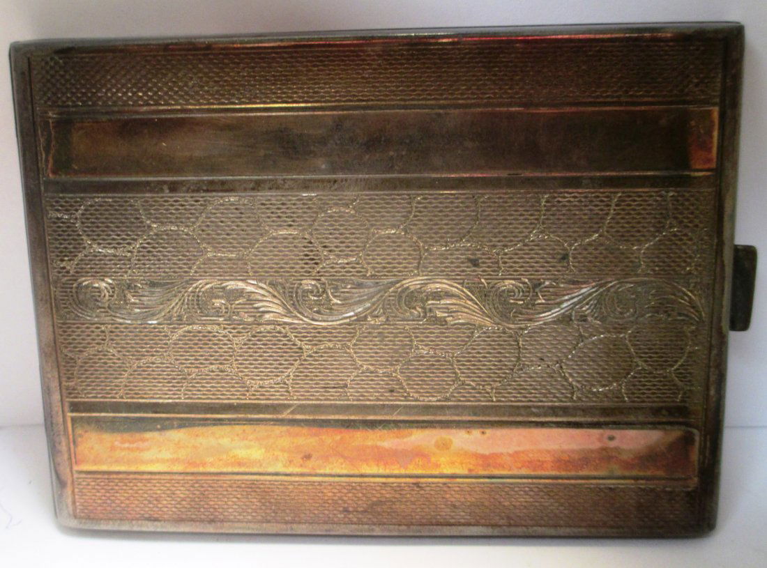 RUSSIAN ANTIQUE SILVER CIGARETTE CASE: Stamped and Marked on Inside Striped design with engraved inlaid center. Measures 5" Long x 3" Wide weights 4.7 Troy Oz.