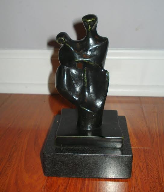 HENRY MOORE ENGLISH BRONZE SCULPTURE OF WOMAN & CHILD: Henry Spencer Moore (1898 – 1986) English abstract bronze of women with child ( attr.) Initial H.M. and numbered 2/6 Size: 4” x 4” base sculpture- 5.5” H