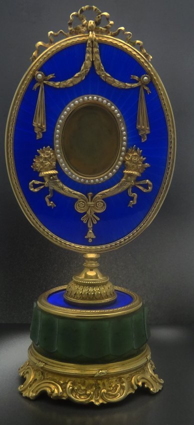 RUSSIAN SILVER ENAMELED & NEPHRITE OVAL FRAME: RUSSIAN NEPHRITE BASE PICTURE FRAME With Sapphire on Base of Column. Pearls in Center of Picture Frame, Cobalt Enamel Center, 88 Sterling Silver Makers Mark E.K. Town Hall MAarks..weight: 321.8g Heigh