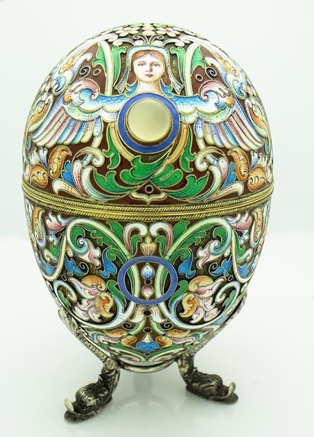 LARGE RUSSIAN SILVER ENAMEL EGG WITH ANGEL PORTRAIT: Large Russian Silver Enamel Egg with Angel comes with Large Green Jade Stone. Stamped with 88 Silver Purity Mark, and Maker's Mark. Enamel is Multi Colored Floral Pattern with Large Figure of Angel ab