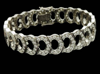 18KT GOLD CARTIER DIAMOND BRACELET: 18KT Gold & Diamond Cartier Bracelet. Comes in original Cartier Box Bracelet is 7.5 inches long