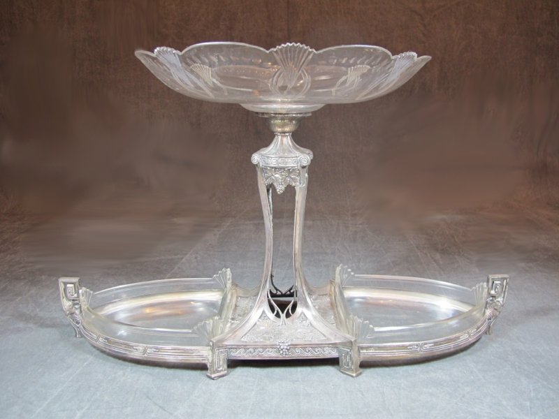 Antique German WMF silverplate & glass fruit stand: Antique German WMF silverplate & glass fruit stand, marked. 12 7/8" H x 21 5/8” W x 12” D. Shipping in USA is $ 100.00. International bidders ask before bid.