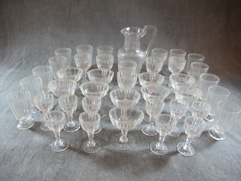 Antique European 41 pcs glass set: Antique European 41 pcs glass set, marked. 10 water glasses, 10 liquor glasses, 10 wine glasses, 10 champagne glasses and 1 pitcher. Shipping in USA is $ 120.00. International bidders ask before bid.
