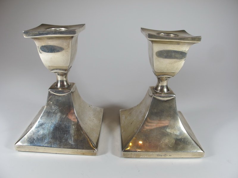 Old pair of Argentinian sterling 925 candlesticks: Old pair of Argentinian sterling 925 candlesticks, marked. 4 5/8" H x 3 1/4” W. Shipping in USA is $ 15.00. International bidders ask before bid.