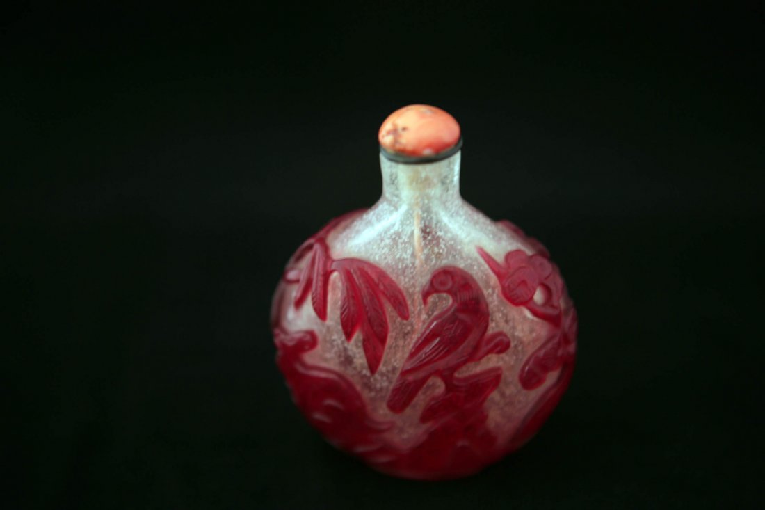 Peking glass snuff bottle with red top: Peking glass snuff bottle with red top