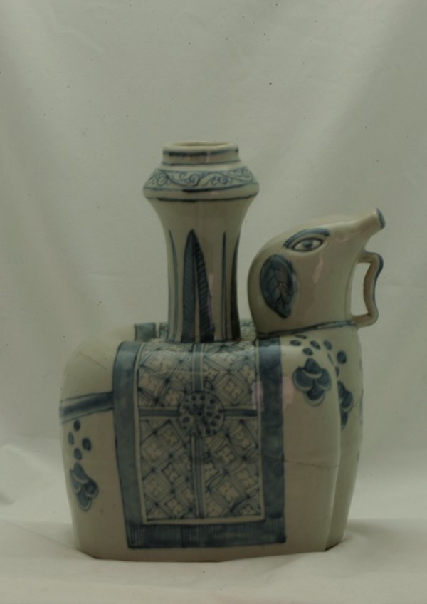 A Blue and White Army Kettle: In Ming Dynasty style in the shape of a bird. A/F 26cm high.