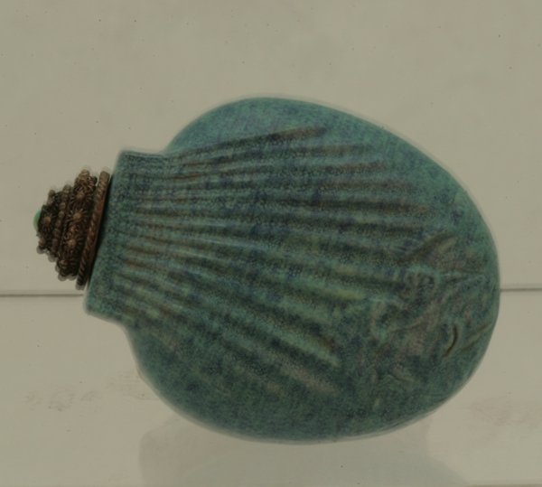 A porcelain Snuff Bottle.: Cobalt blue in color and with a ribbed design all around.