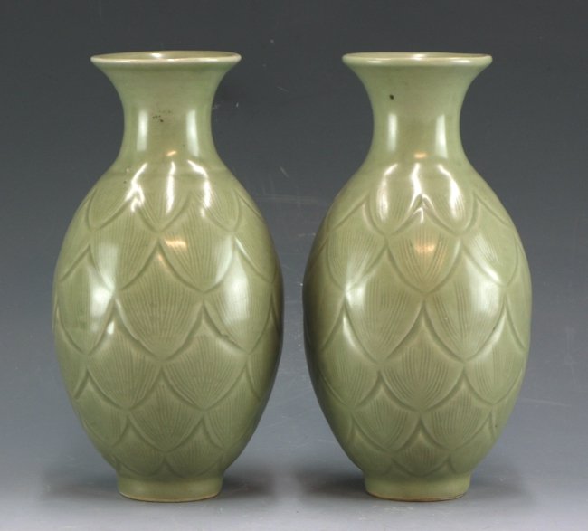 A Pair of Yao Zhou-Ware Vases: Baluster body, carved with leaves pattern. 20cm height.