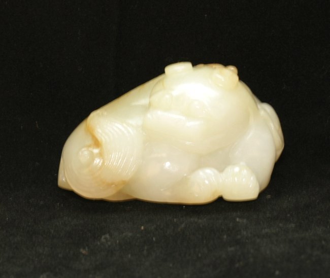 Celadon Jade Carving: Carving of a temple dog. 5.5cm length.