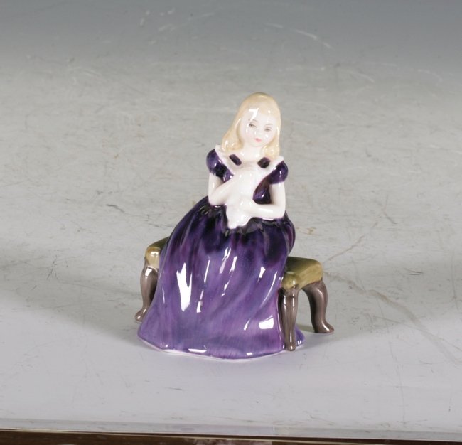 Royal Doulton Figure: Girl in purple dress with a cat sitting on a bench.