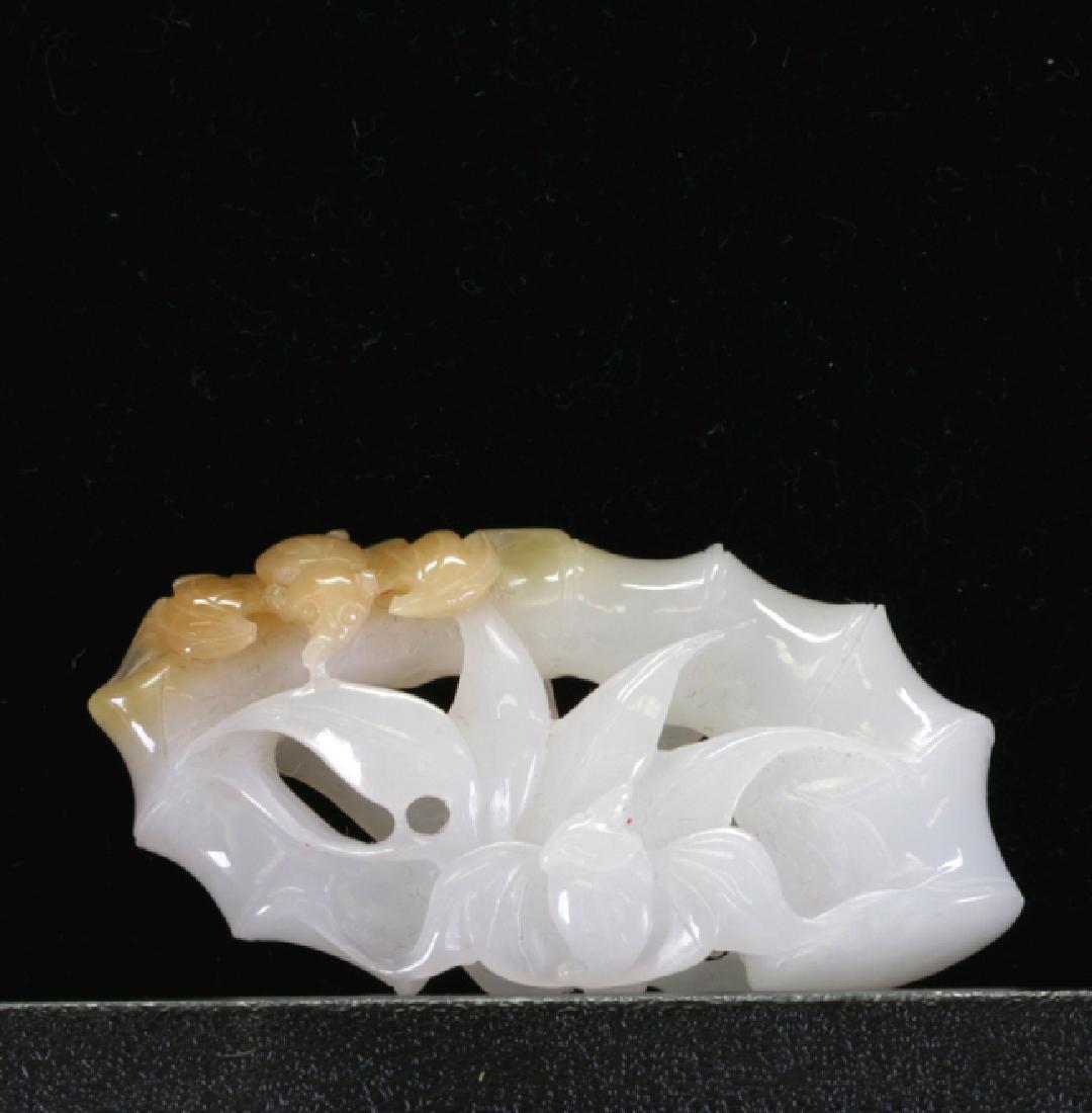 White Jade Item: Mutton fat form, with jade skin.