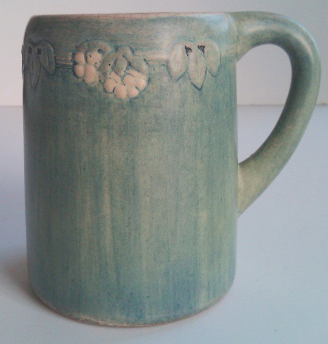 Newcomb College Pottery Mug: Newcomb College Pottery mug, E.Z., 27m, Jospeh Meyer mark, height 4 1/2, width 4 3/4 inches.