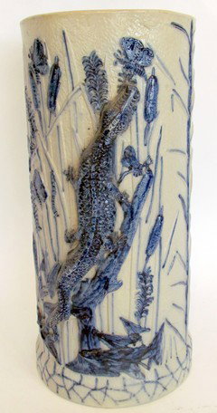Antique Blue & White Stoneware Umbrella Stand: Antique blue and white stoneware umbrella stand, raised alligator, butterflies, flowers, ht. 20, wd. 9 1/2