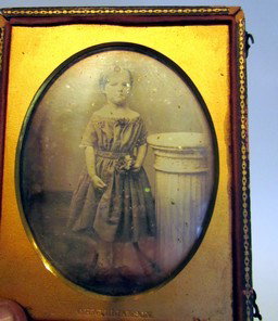 C.H. Williamson Daguerreotype of Girl: C.H. Williamson Daguerreotype of Girl, ht. 4 3/4, wd. 3 1/2 inches and ambrotype of baby in chair