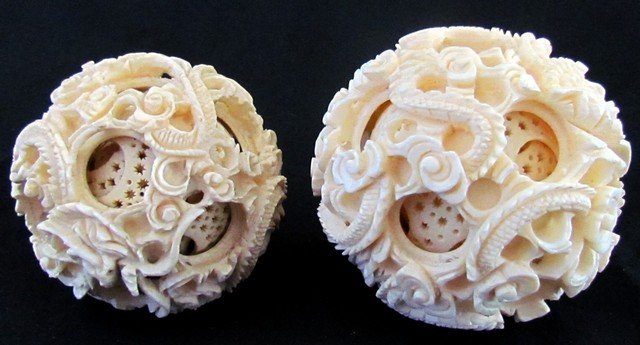 Two Antique Oriental Carved Ivory Puzzle Balls: Two Antique Oriental Carved Ivory Puzzle Balls, diam. 2 1/4, diam. 2