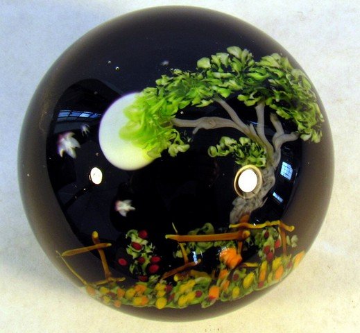 Paperweight Moon and Tree Design: Art glass paperweight with full moon and tree detail, signed and dated, measuring 3 inches wide by 3 inches high