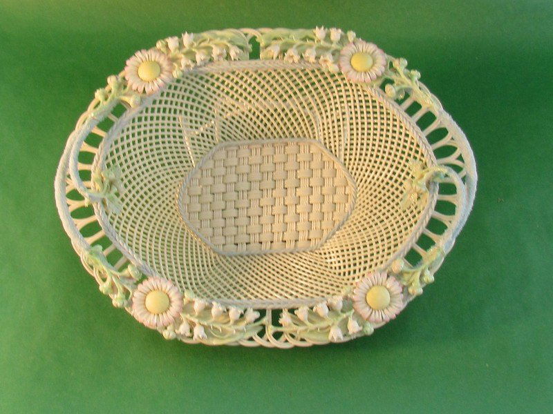 Irish Belleek Boston basket encrusted with flowers: Irish Belleek Boston basket encrusted with flowers, ht. 2, wd. 13