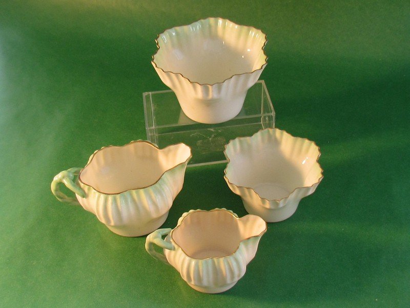 Lot of two creamers and two sugars: Lot of two creamers and two sugars, green hexagonal pattern. All second mark, black, ht. 4 1/2, wd. 2 1/2