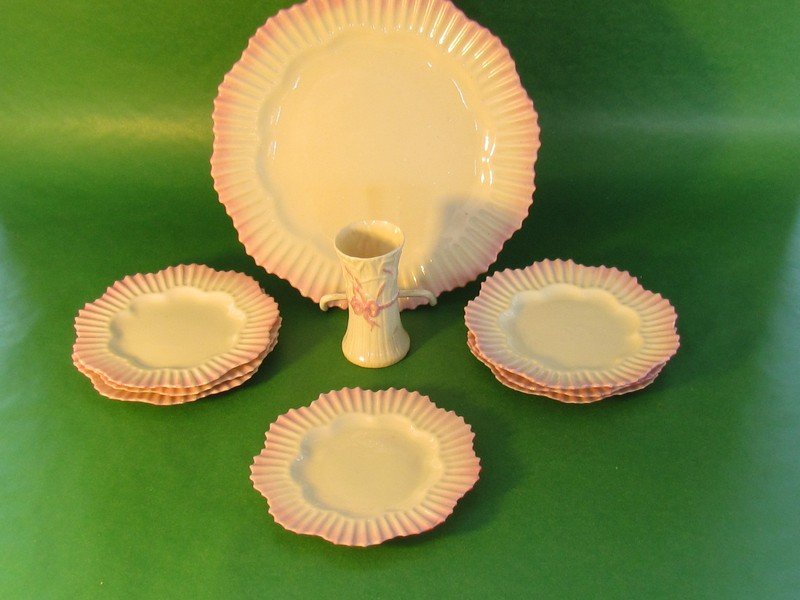 Small lot of pink hexagonal ware: Small lot of pink hexagonal ware. One cake plate, seven bread plates, together with a Typha spill vase. All second mark, black, cake plate 9 1/2 diam.