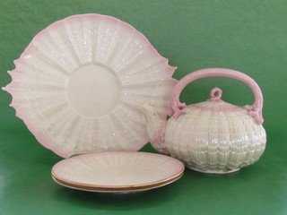 Small lot of pink Tridacna pattern ware items: Small lot of pink Tridacna pattern ware items, a cake plate, two dessert plates and a tea kettle, excellent condition, all first mark black. (Kettle spout shows minor chipping.), kettle ht. 6 1/2, wd.