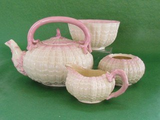 Small lot of pink Tridacna pattern ware items,: Small lot of pink Tridacna pattern ware items, a tea kettle, waste bowl, creamer and sugar, noticeable repair to sugar lid and creamer has a crack, all second mark black, tea kettle ht. 6, wd. 8