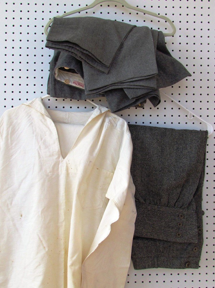 Lot of Men's Hats and Clothing.: Small group of men’s clothing and hats. Four pairs of wool shorts, white sailor shirt and pants, one pair knickers, Dunlap top hat and WarePratt Co bowler hat with box, etc. All in excellent conditi