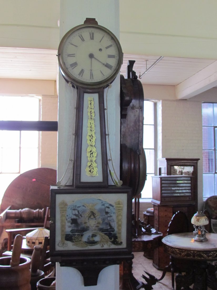 Reverse Painted Banjo Clock: Reverse painted banjo clock, US ships, no finial, ht. 34, wd. 10, some veneer loss. (Finial just found)