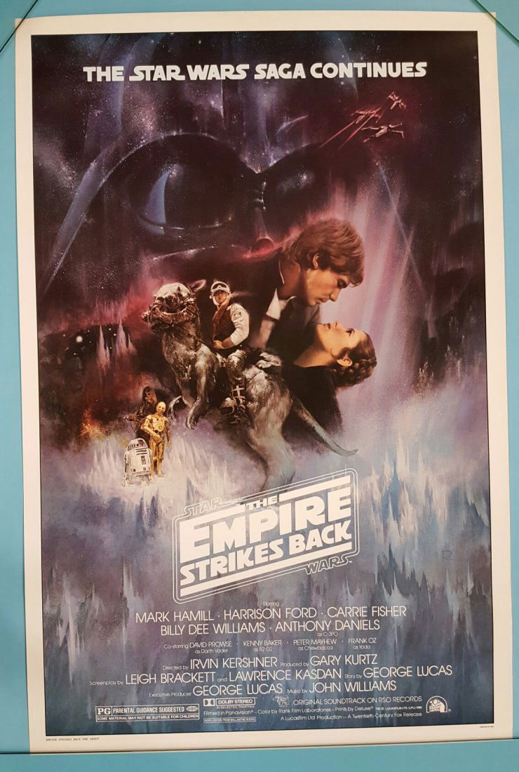 The Empire Strike Back (1980) One Sheet Movie Poster: (20th Century Fox) 27" x 41" unrestored rolled one sheet poster with very minor edge wear and possible minor creases or scuffs. This poster is in excellent condition and appears to be unused.