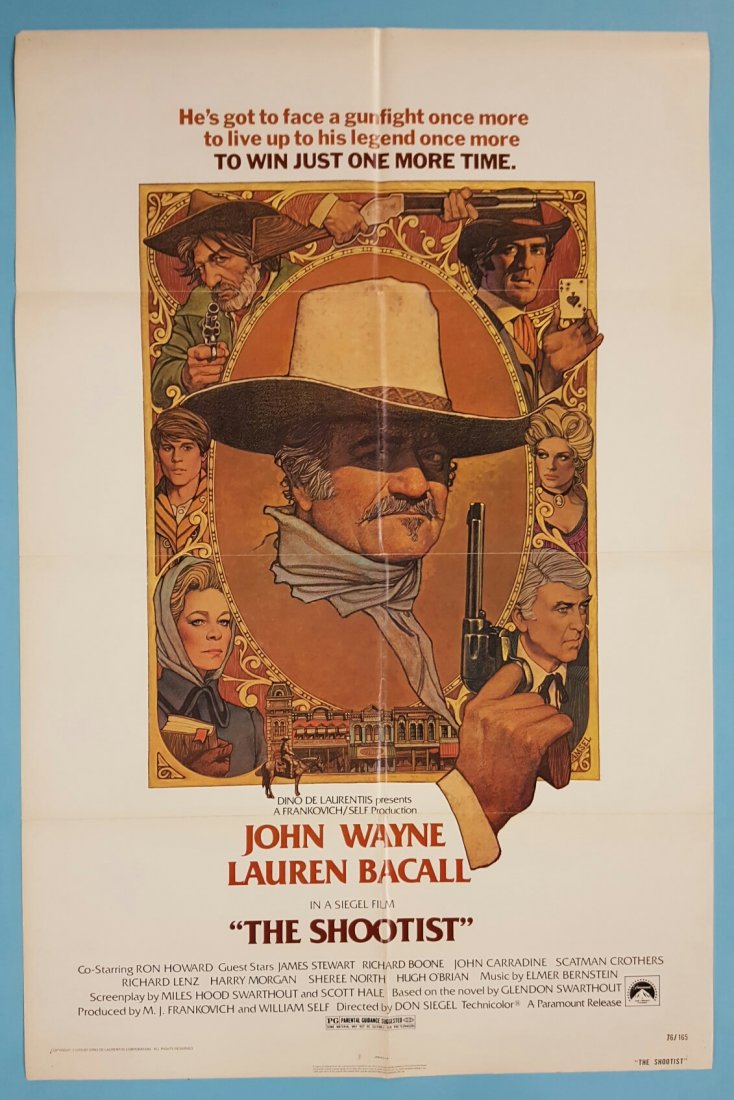 The Shootist 1976 One Sheet Movie Poster 27" x 41": (Paramount) Starring John Wayne & Lauren Bacall. This is a folded unrestored poster with bright color and light fold wear, staple holes, and minor stains. May have other very minor imperfections. This