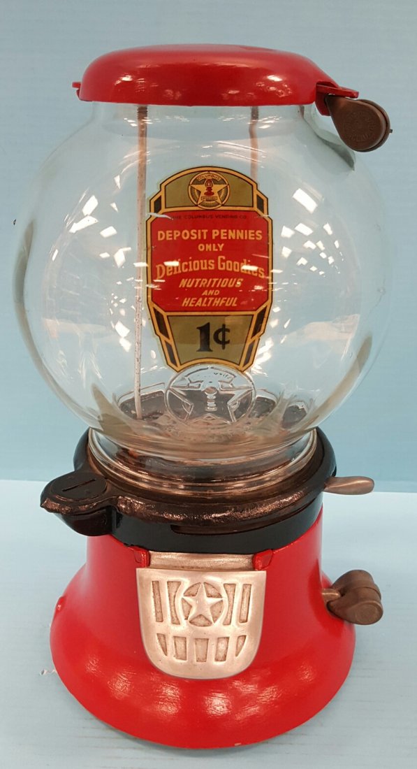 Columbus Peanut Machine 1 Cent Coin Operated: An original 1 cent peanut machine working and complete with barrel locks and key. The Columbus Vending Co. logo decal is in excellent condition and the glass is embossed in the front and the back with