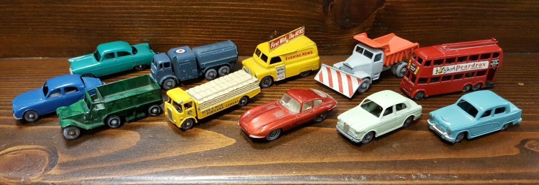 11 Matchbox 1-75 Regular Wheels Series: All 11 cars in this lot have grey wheels. 1. #65 Jaguar 3.4 litre 2. #49 M3 Personnel Carrier with paint. 3. #51 Albion Chieftain 4. #32 "E" Type Jaguar 5. #57 Wolseley 1500. 6. #36 Austin A50 7. #33
