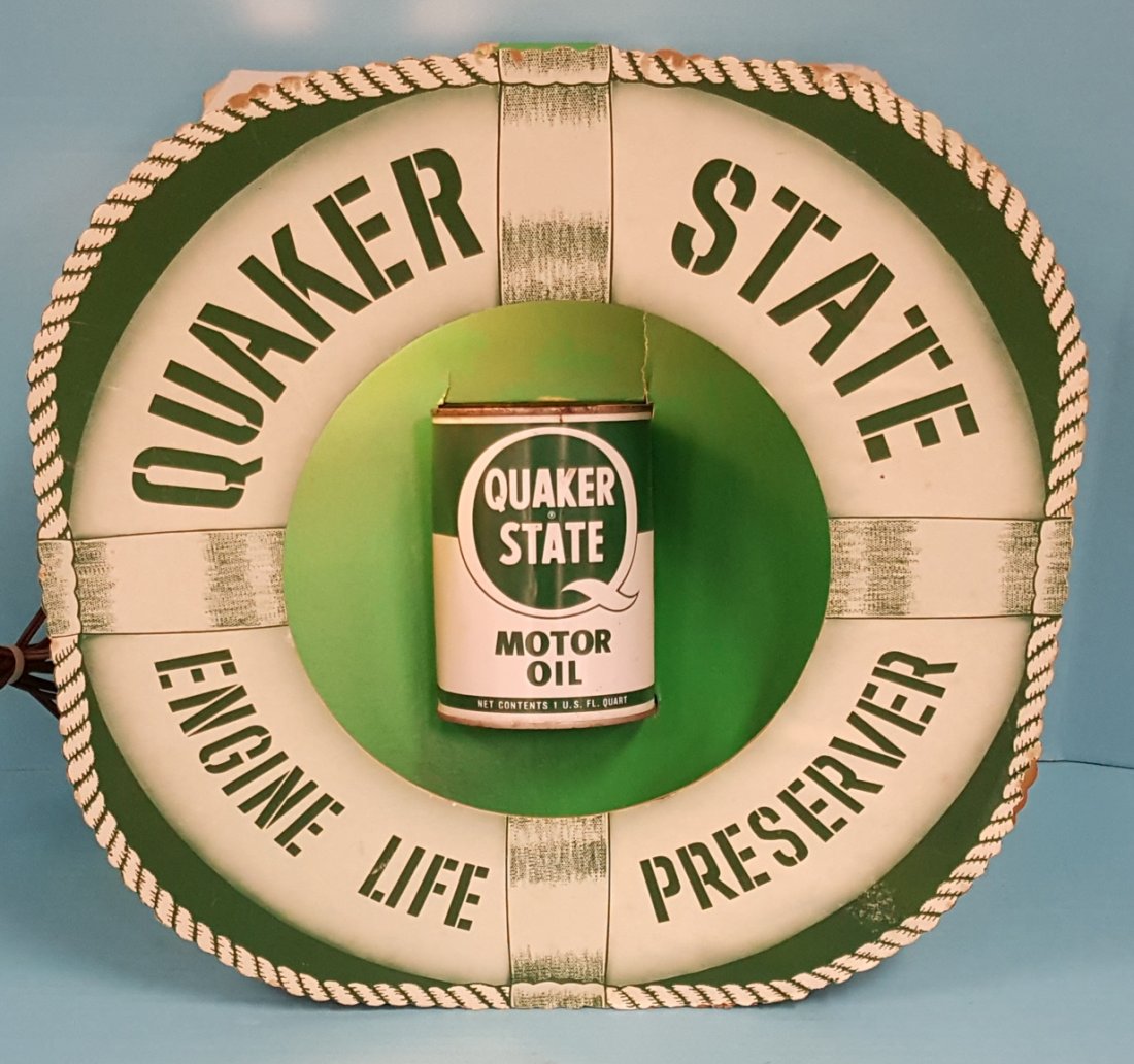 Quaker State Cardboard Oil Can Display: 17" x 17" Engine Life Preserver self standing display with flashing light which holds one can of oil. Comes with 1 full can of Quaker State oil.