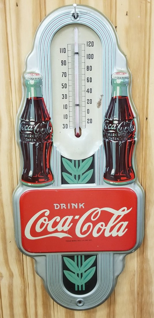 NOS 1941 Coca Cola Double Bottle Thermometer: 15.5" x 7" Excellent condition new old stock thermometer with very minor scuffs and a small rust spot next to the number 20. Please read and understand the payment and shipping terms for this auction