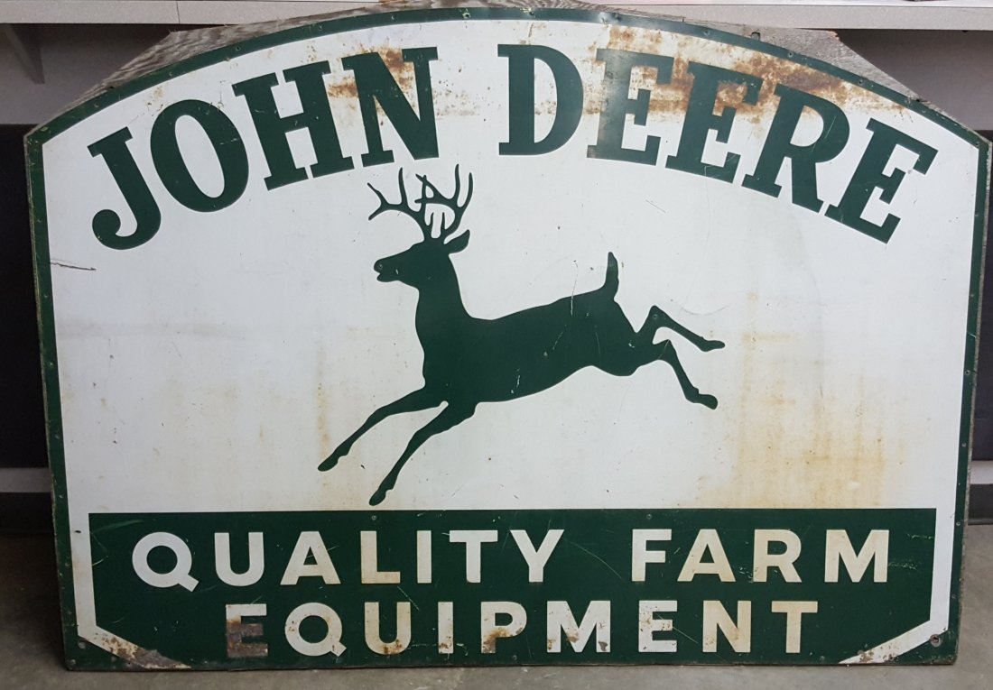 Scarce John Deere Quality Farm Equipment Sign: 66" x 47" Scarce Original sign with the rare green & white color scheme. This sign originally had a privilege panel at the bottom. The sign is in original condition with scuffs, scratches, stains and 