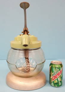 Orange Crush Soda Fountain Ribbed Syrup Dispenser: 16" x 9" Syrup dispenser with green porcelain top, metal pump handle, ribbed glass with solid Crushy logo on front, and aluminum base in excellent condition. PLEASE READ AND UNDERSTAND THE PAYMENT &