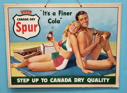 Canada Dry Spur Cardboard Sign "It's a Finer Cola": 20" x 14.75" NOS easel back cardboard sign with bright colors, original hanging string, couple minor surface scuffs, and bottom right corner has been bent. PLEASE READ AND UNDERSTAND THE PAYMENT AND