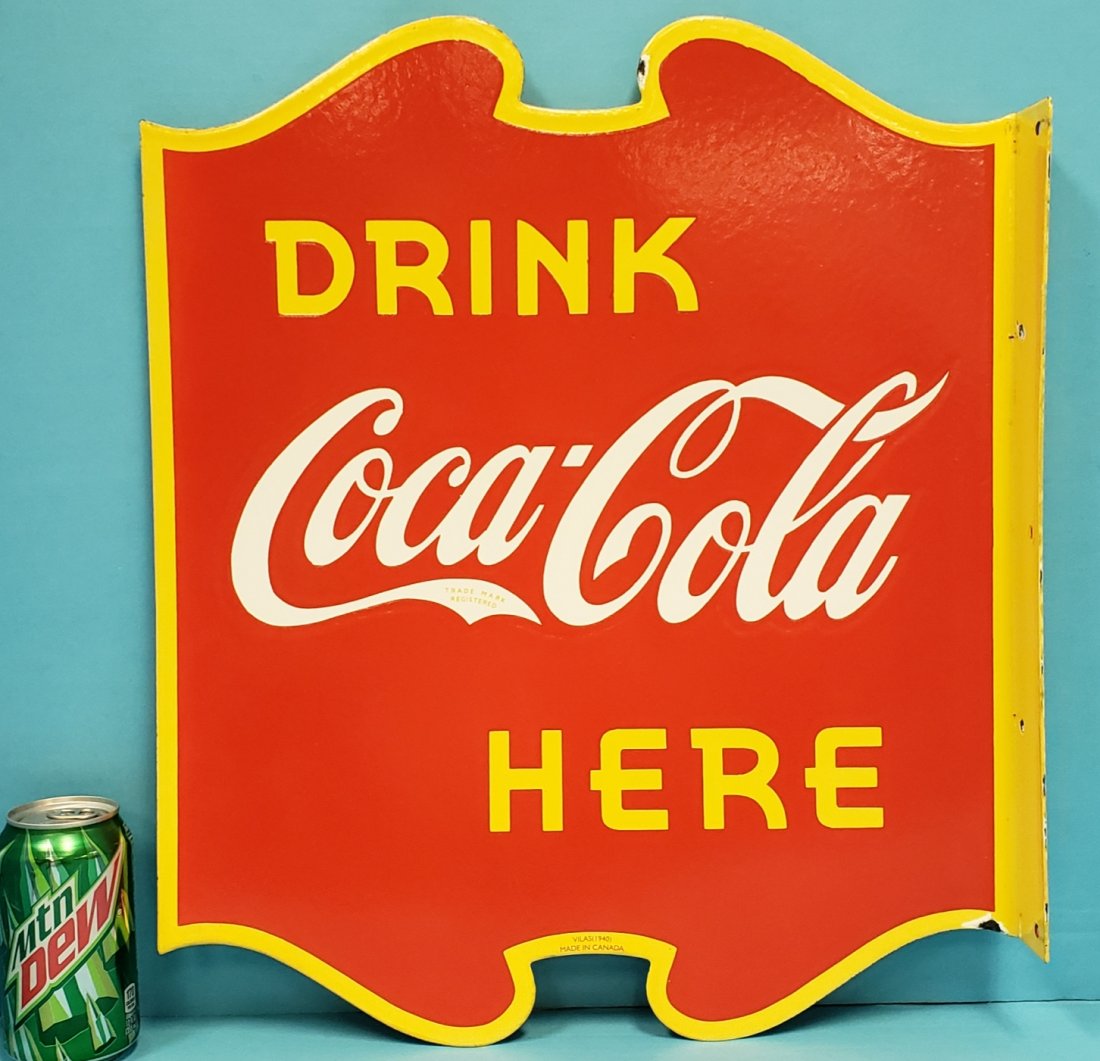 1940 Porcelain Canadian Coca Cola Flange Sign: 17" x 20" Porcelain Canadian Sign By Vilas dated 1940. This sign looks New Old Stock with super gloss and a couple of very minor porcelain chips. About as good as it get for this sign. PLEASE READ AND