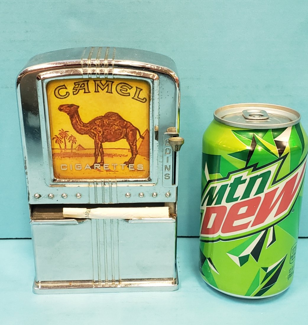 Coin Operated Chrome Cigarette Dispenser Machine: 4" x 6.5" Coin operated single cigarette machine. Insert coin and push down lever to dispense a single cigarette. PLEASE READ AND UNDERSTAND THE PAYMENT & SHIPPING TERMS FOR THIS AUCTION PRIOR TO PLAC