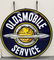 NOS Porcelain Oldsmobile Double Sided Sign w/ Ring